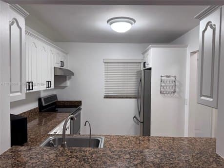 7703 Camino Real Apt 307